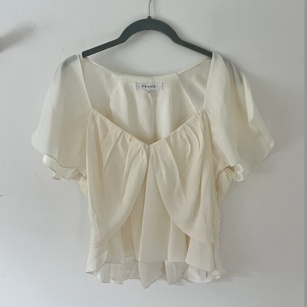 Frame cream blouse in size large